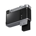 X-E5_backNANAMEunder_batteryOpen_silver.jpg